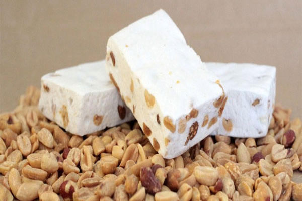 Doces de amendoim torrone nougat